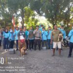 Bhabinkamtibmas Polsek Labangka Dampingi Petugas Puskeswan Suntik Vaksin Rabies