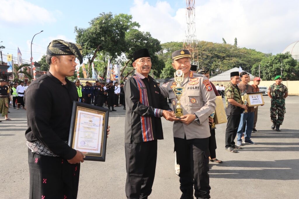 Wujudkan Pilkada Damai Polres Loteng Laksanakan Apel Satkamling