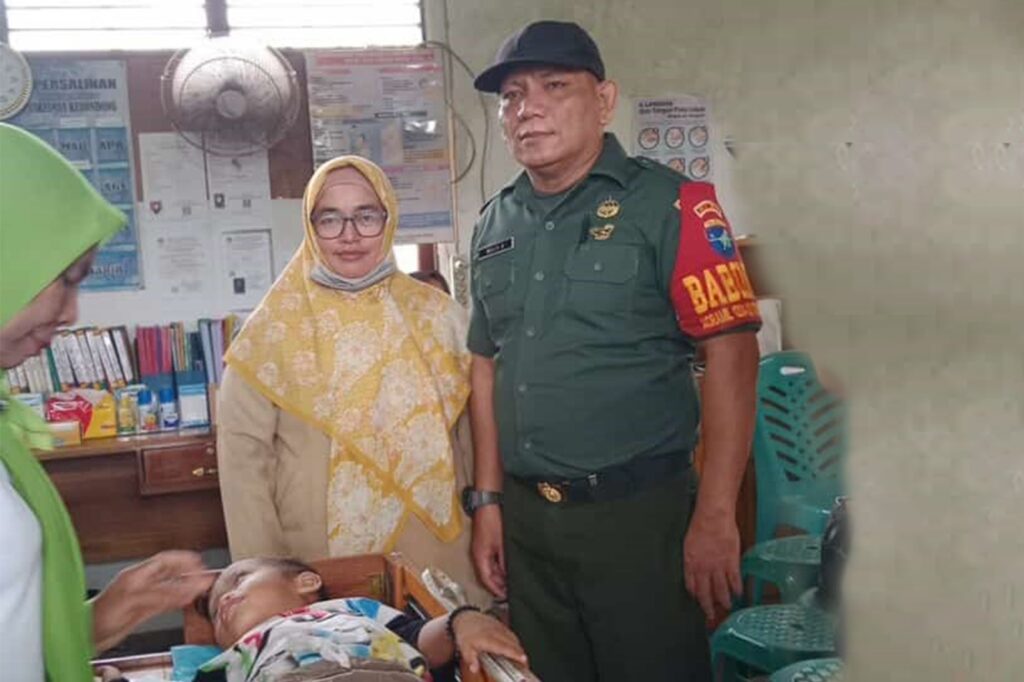 Babinsa Kelurahan Sampit Dampingi Kegiatan PMT Di Wilayah.