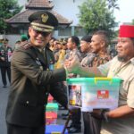 Hadiri Upacara Peringatan HUT TNI ke-79, Dandim Madiun Ajak Masyarakat Ikut Ciptakan Stabilitas dan Keamanan Nasional 