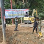 TMMD HST Tancap Gas: Alat Berat Ratakan Jalan Baru