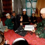 Satgas TMMD ke-124 Kodim 1002/HST Bangun Mental Spiritual Warga, Ajari Anak-anak Mengaji