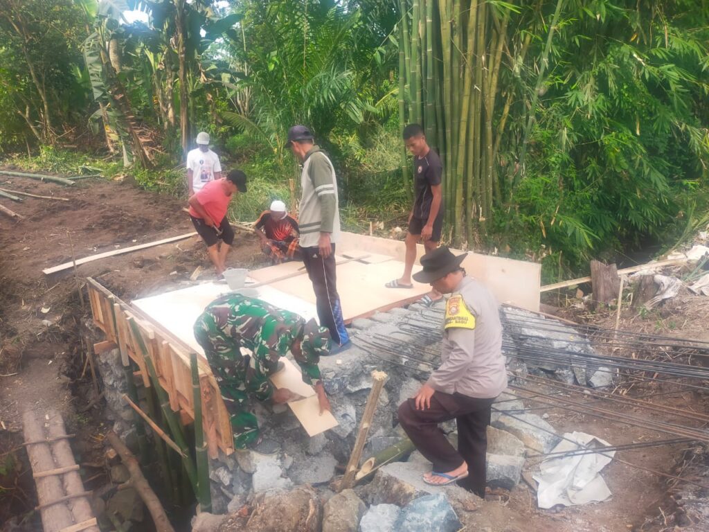 Program TMMD di Desa Bagu Segera Rampung, Sisa Satu Jembatan Sedang Di Kerjakan