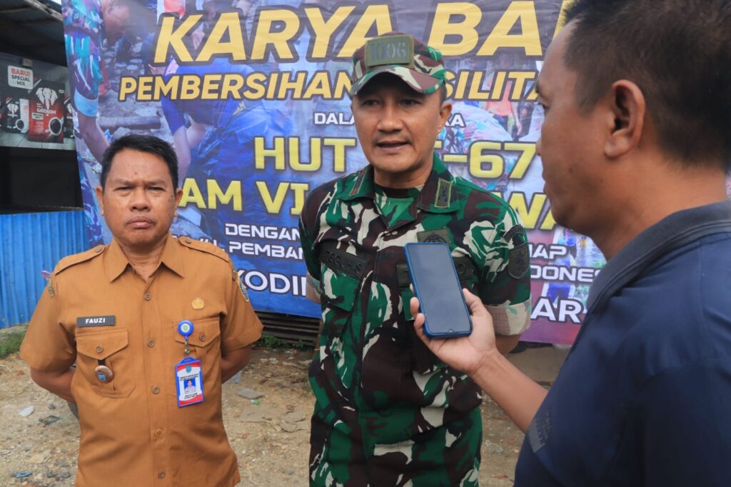 KODIM 1006/BANJAR GELAR KARYA BAKTI DI PASAR ASTAMBUL PERINGATI HUT KE-67 KODAM VI/MULAWARMAN