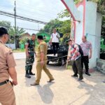 Dorong Transparansi dan Pembangunan Desa, Babinsa Bajangan Hadiri Monitoring dan Evaluasi