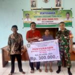 Babinsa Koramil 1015-07/Parenggean Dampingi Penyaluran BLT Dana Desa